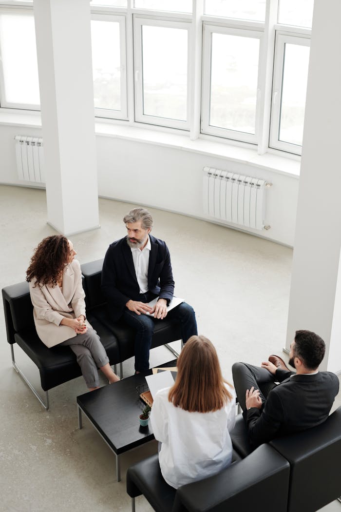 Team discussing project strategies in a modern office.